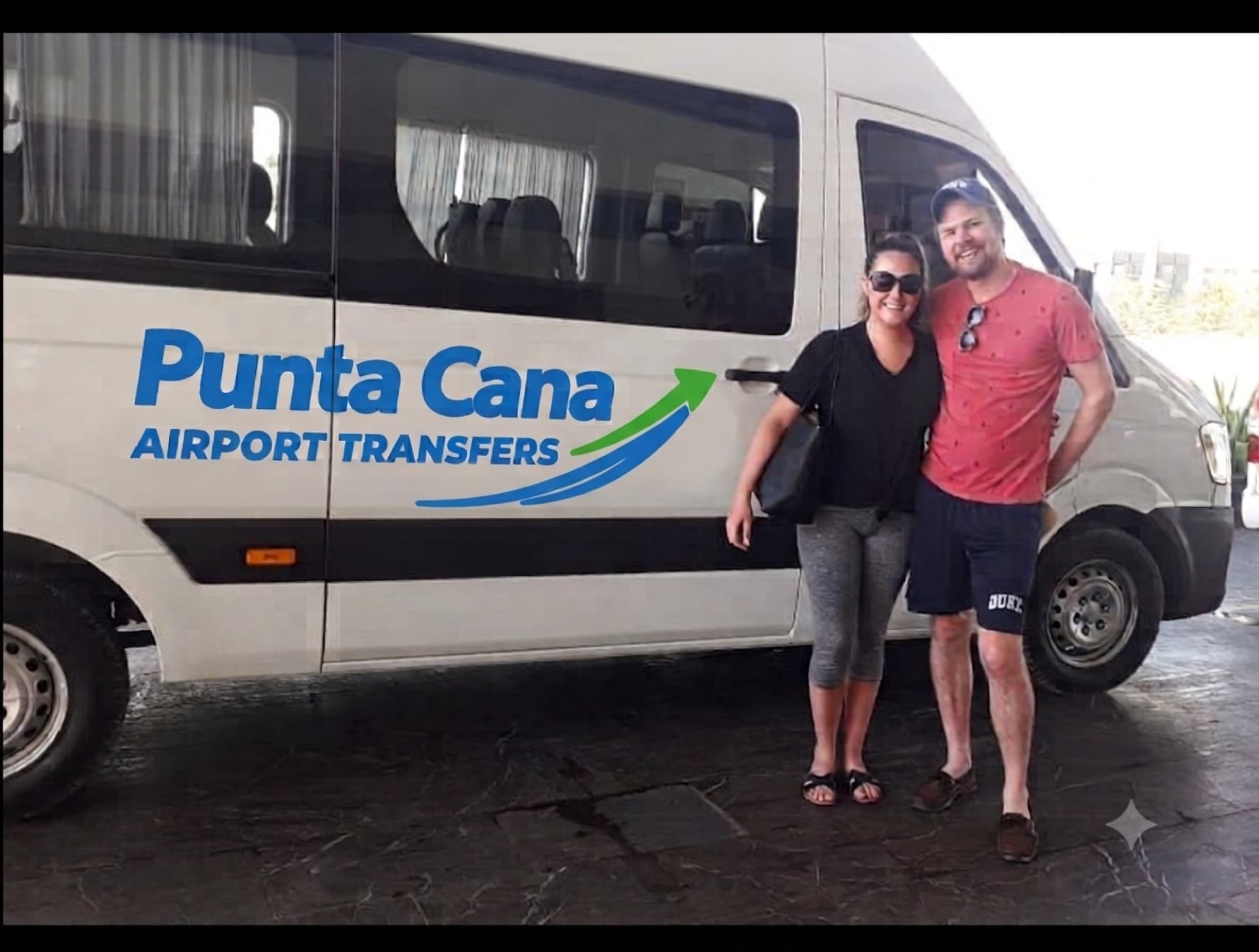 Two travellers standing beside their Punta Cana Airport Transfers van after arriving at their hotel